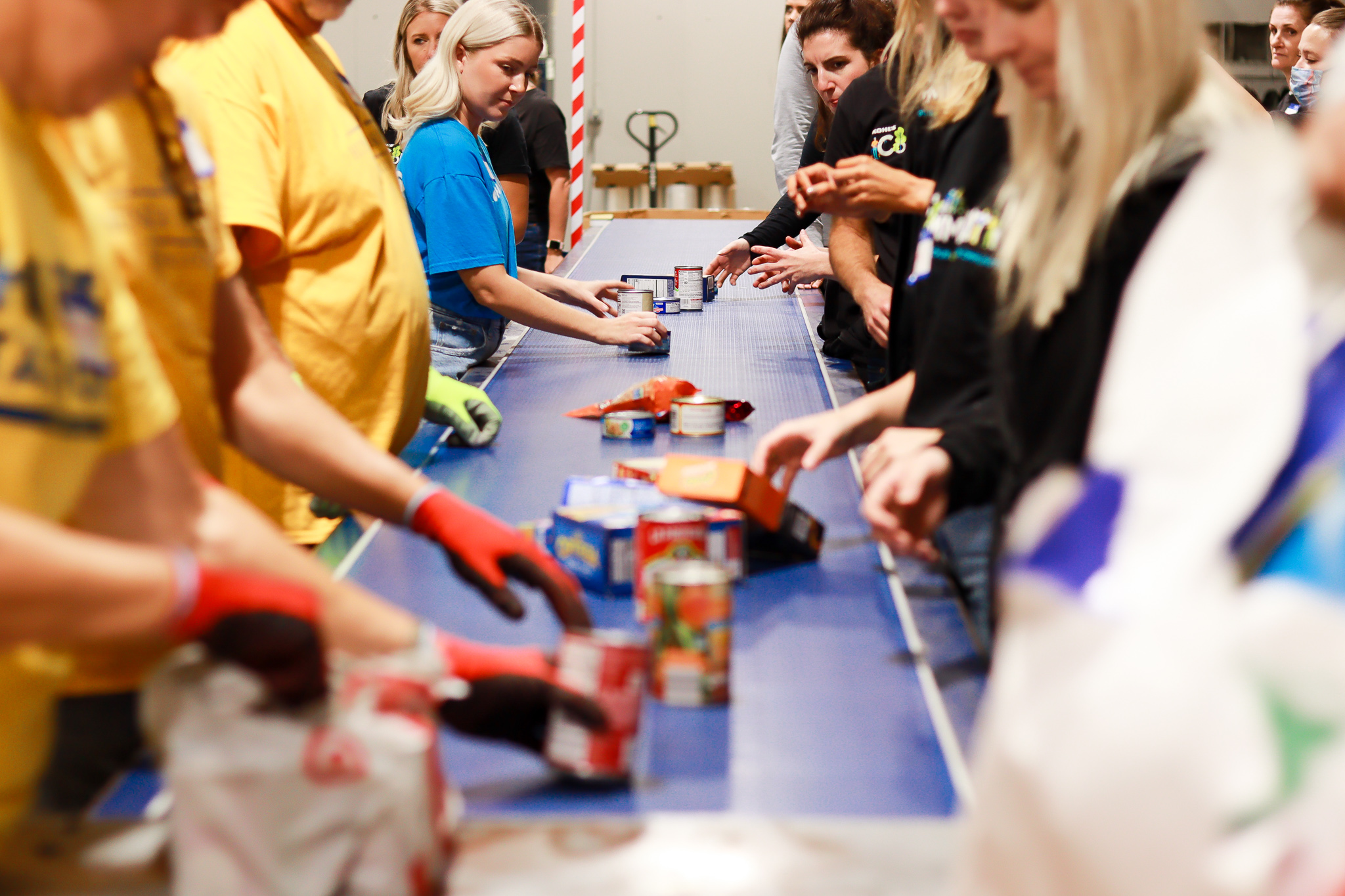 Volunteers sorting food at Hunger Task Force
