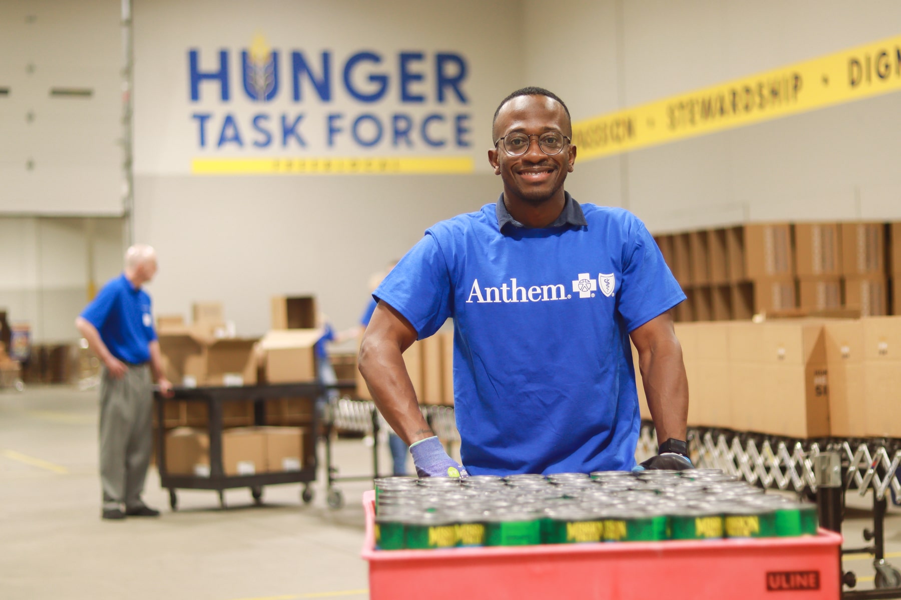 Volunteers packing Stockboxes for seniors